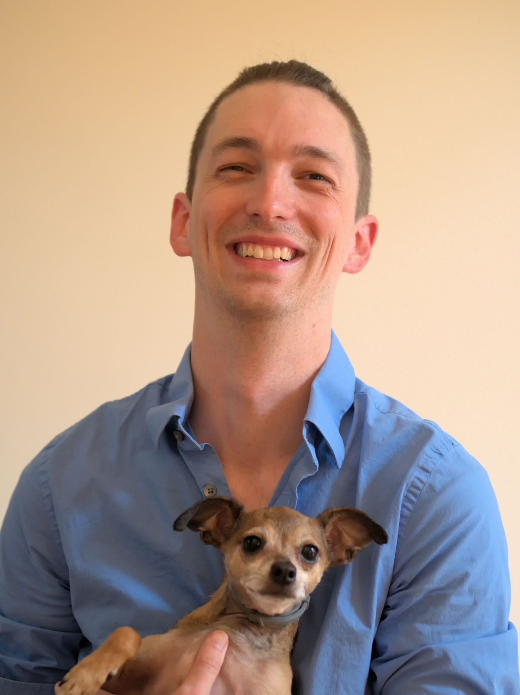 Photo of Zach and his dog Moose.